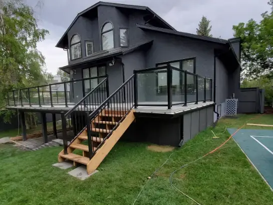 Spacious custom-built wooden deck for outdoor living in Calgary.