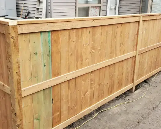 Modern wooden privacy fence ensuring security for a Calgary home.